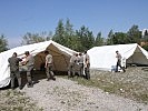 Die Salzburger Pioniere beim Aufbau von Zelten in Wals-Siezenheim. (Bild öffnet sich in einem neuen Fenster)