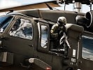 Ein Bordschütze in einem S-70 "Black Hawk". (Bild öffnet sich in einem neuen Fenster)
