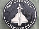 Viele Abzeichen zeigen die Flugzeuge. Hier ist es der Eurofighter... (Bild öffnet sich in einem neuen Fenster)