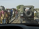Unterwegs über den Schari, der die Grenze zu Kamerun bildet. (Bild öffnet sich in einem neuen Fenster)