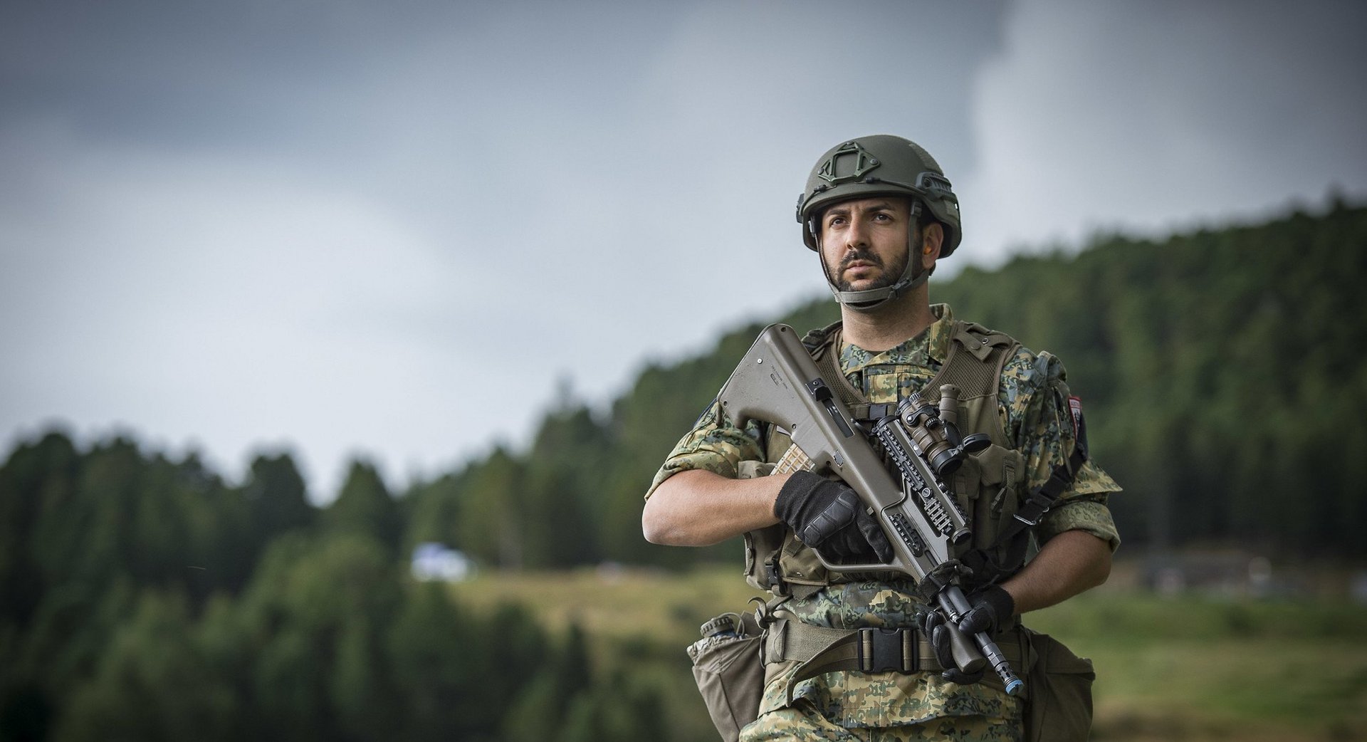 An infantry soldier moves carefully during training.